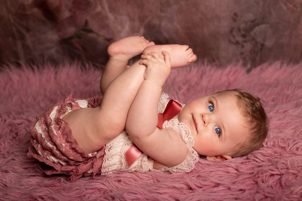 Séance photo bébé 6/9mois sur fond rose